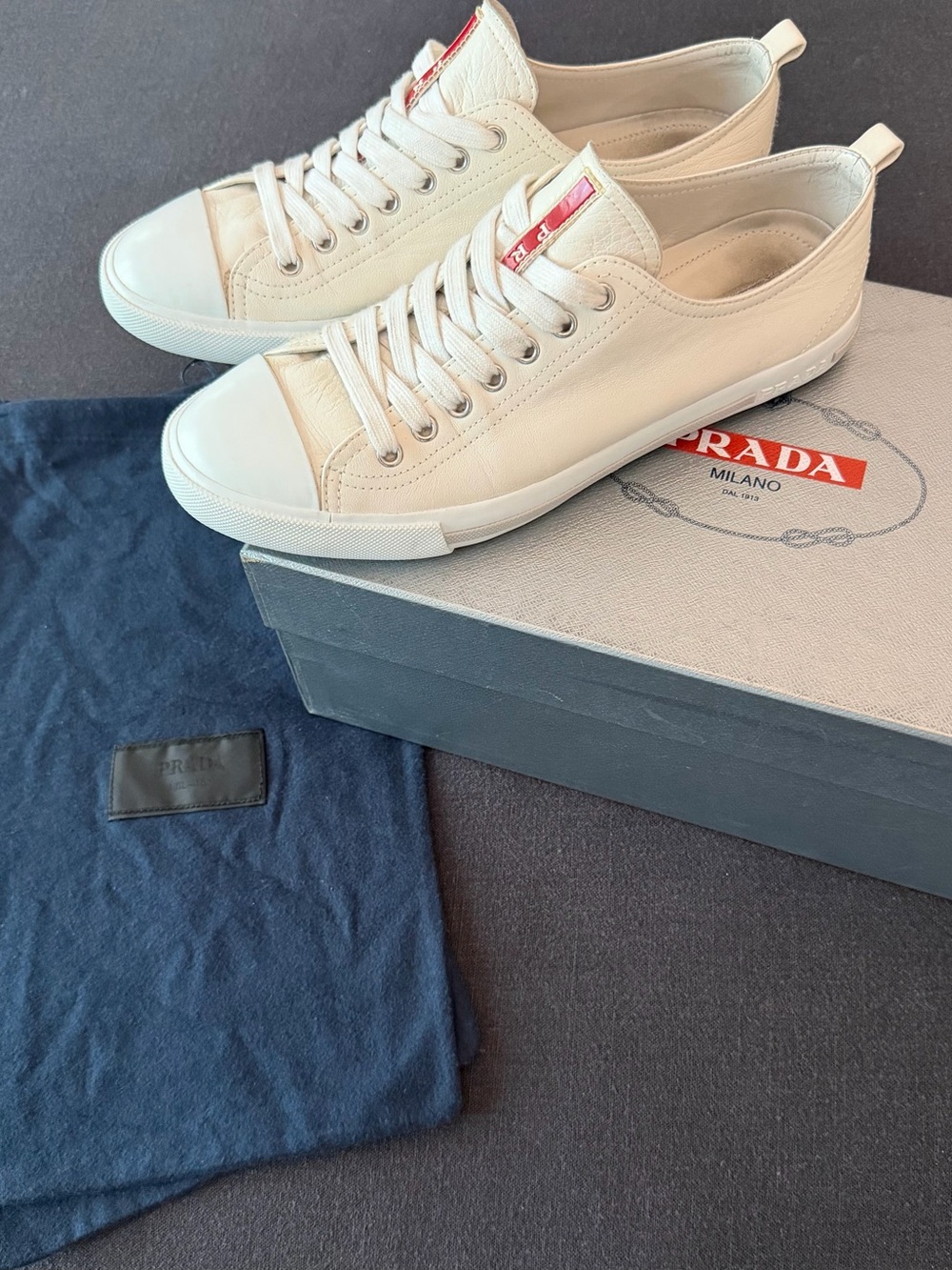 Prada White Leather Low-Top Sneakers with Red Logo Tab